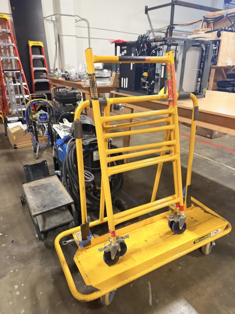 Metaltech Jobsite Series 4' Safety rail & tool shelf, a type of portable utility scaffold.