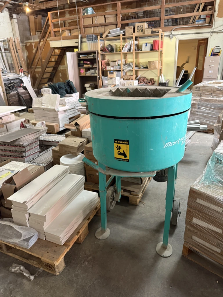 IMER Mix 120 Plus portable vertical shaft mixer.